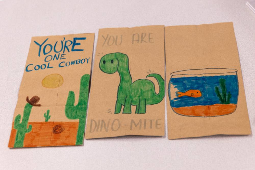 Some student-designed paper bags for Kids  food basket